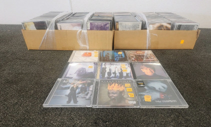 (2) Boxes of CD's Including Drowning Pool, Avril Lavigne, Matchbox20, Queen Latifah, And More!