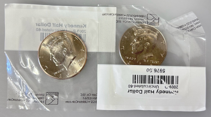 (2) 2009 Uncirculated Kennedy Half Dollars