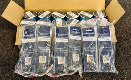 (12) Rolls Of Danielson Blue Premium Fishing Line and 60+ Packs Of Baitholder Hooks