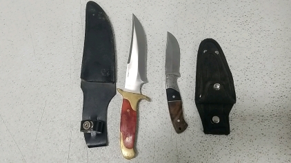 (2) Knives w/ Cases