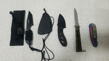 (2) Knives w/ Cases (1) Butterfly Knife (1) Pocket Knife