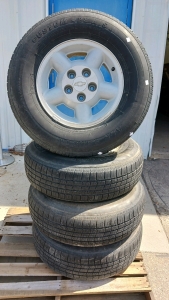 (4) Custom 428 A/S Tires on Chevy Rims - P235/75R15 - All Season