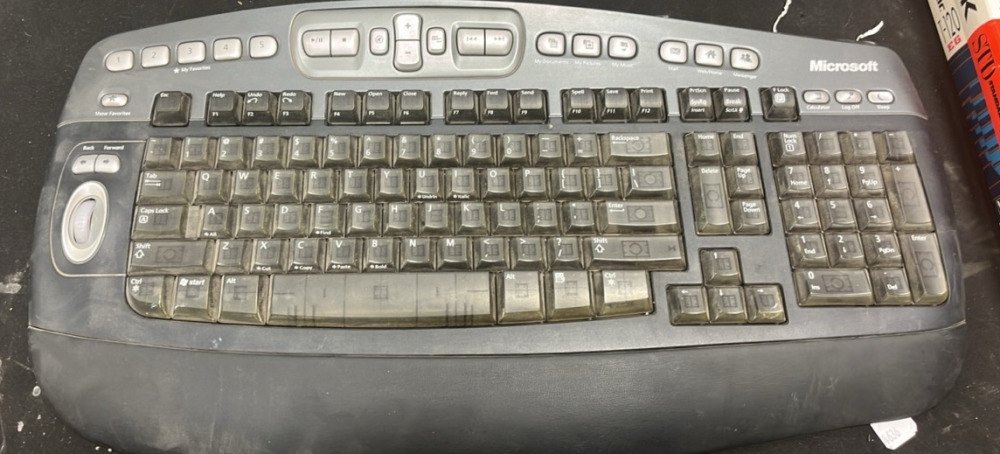 (1) Mitsubishi VHS Player (1) Keyboard (9) VHS Tapes (1) Black & Decker ...