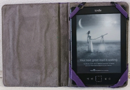 (1) Amazon Kindle E-Reader w/ Purple M-Edge Case - Black
