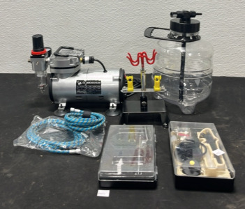 (1) GS Elite-125x Pump (2) Air Hoses (1) Desk Brush Holder (2) Air Brush Kits (1) Plastic Air Tank