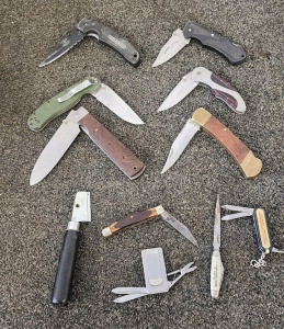 Smith & Wesson Pocket Knife, Mail Letter Opener, And An Assortment Of Other Pocket Knives.