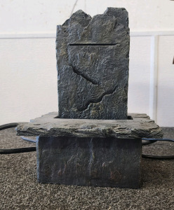 Electric Waterfall, A Box Of Vases, And A Box Of Little Statues