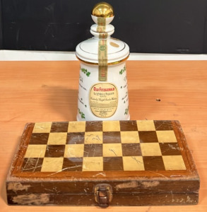 (1) Old Fitzgerald Leprechaun Bottle (1) Chess Board With Chess and Domino Pieces