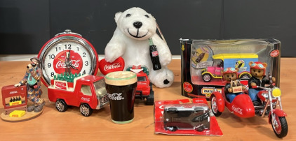 (1) Vintage Coca-Cola Alarm Clock (1) Vintage Matchbox 1926 Ford Model TT Easter Delivery Van (1) Coca-Cola Die Cast Metal Van & Much More