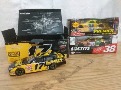 3) NASCAR 1:24 Scale Diecast Cars-Matt Kenseth DeWalt-Owners Series, Ken Schrader M&Ms, and Elliott Sadler M&Ms