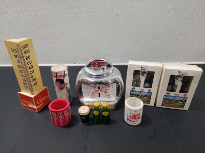 Assorted Coca-Cola Collectables, Vintage Juke-Box Cookie Jar, Vintage Thermometer, (Empty) Can Shaped Phone Can Box, (2) 1996 Boise River Festival Box Sets, Coozies, Coca-Cola Shaker, Squirt Shakers
