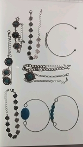Silver Toned Bracelets/Wrist Pieces