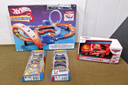 (1) Hot Wheels Blast Launch Face Off Track W/ (2) Cars, (1) Hot Wheels Let's Race Car 5-Pack, (1) Hot Wheels HW Motor Show Car 5-Pack & (1) Cars, Lightning McQueen RC Car