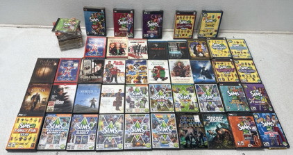 Assorted CDs And DVDs Sims 2 And 3 PC Games And Assorted Movies