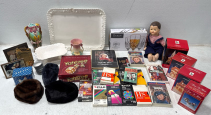 Assorted Kitchenware, VHS Tapes, Christmas Village Collections, Hats, Doll, And More