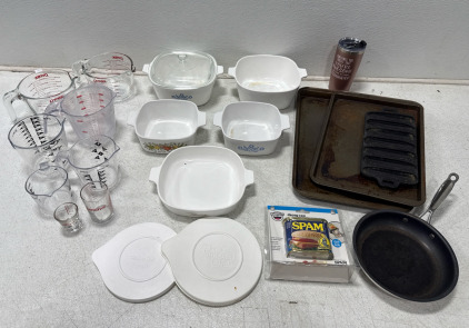 (2) Glass Pyrex Liquid Measuring Cups, (5) Corningware Glass Cooking Dishes With One Glass Lid, Baking Pans, Cast Iron Corn Pan, Spam Can Secret Decoy Safe