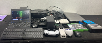 (1) Assortment of Electronics (2) Laptops (2) Keyboards & Much More!
