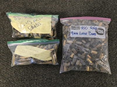 (1) Bag Of 400 9mm Luger Brass Casings, (1) Bag Of 88 .44 ACP Brass Casings, (1) Bag Of .223 Brass Casings