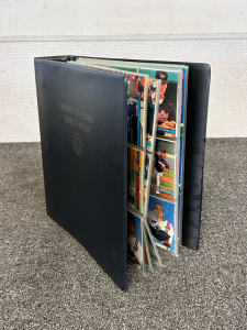 Binder With 20+ Pages Of Baseball and Football Cards
