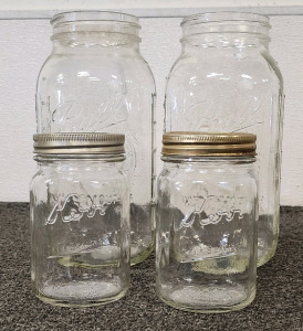 (2) Boxes Of Small And Large Mason Jars.