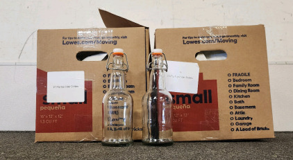 (2) Boxes Of Flip Top Cider Bottles