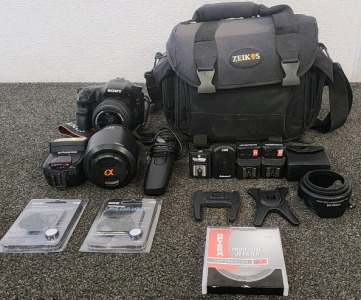 Sony Alpha 57 Single-Lens Translucent Camera With Accessories And Carrying Case.