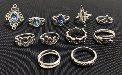 (11) Assorted Sized Silver Toned Blue Topaz/ Silver Toned Rings