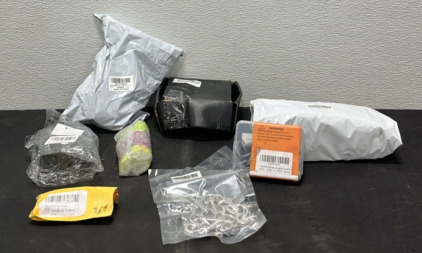 (1) Small Gas Tank (1) Bag of Thread Adapters (1) 8pc Flag Clips for Flagpole(1) Container of Furnitre Leg Protectors (1) Fuel Hose (1) Easle Triangle Bracket (3) Fabric Glues