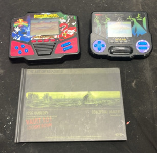 (1) Power Rangers Game Device (1) Batman Game Device (1) Art of Fallout 3 Book (1) Fallout New Vegas Picture Piece