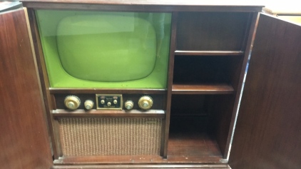 Vintage television cabinet with record player