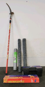 Tree Pruner, (3) Rolls Of Chicken Wire, Tire Chains, And A Electric Pet Controller Kit.