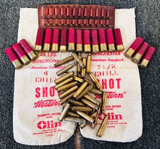 (17) Rounds Of 12 Ga. Cartridges, (2) Vintage Winchester Canvas Sacks, Leather Ammo Holder, and Brass Casings