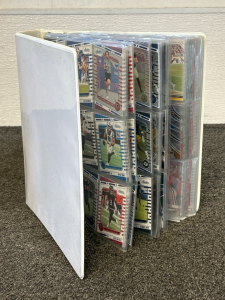 Binder With 20+ Sleeves of Sports Cards