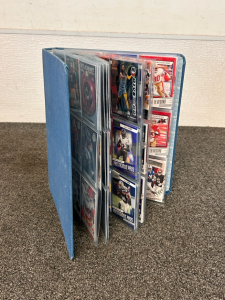 Binder With 10+ Sleeves of Sports Cards
