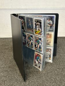 Binder With 20+ Sleeves of Sports Cards