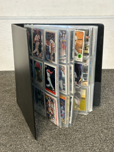 Binder With 20+ Sleeves of Sports Cards