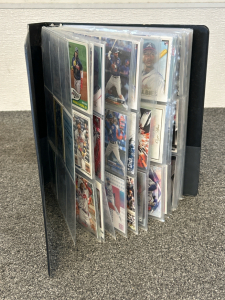 Binder With 20+ Sleeves of Sports Cards