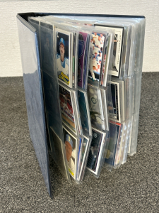 Binder With 20+ Sleeves of Sports Cards