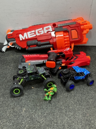 Child Nerf Guns, Ninja Turtle Figure, and More