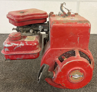 Red Briggs & Stratton 5HP gasoline engine