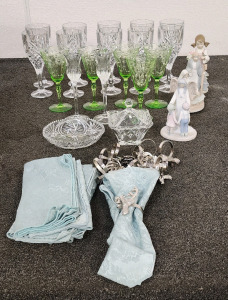 Crystal Glasses, Dining Napkins With Decorative Rings, Figurines, and More.