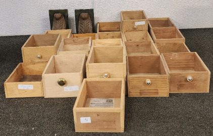 (19) Small Wooden Drawers, And A set Of Bookcase Ends.