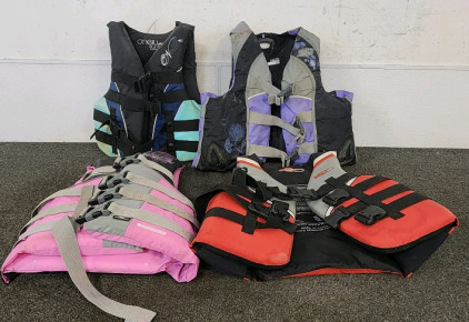 (4) Life Jackets In Varioys Sizes