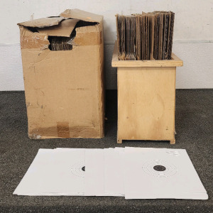 (2) Boxes Of Cardboard Targets And A Stack Of Paper Targets.
