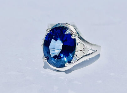 .925 Sterling Silver 10.62ct. Lab Grown Sapphire Corundum & 0.36ct. Diamond Ring Size 7 W/ GGA C.O.A. ( $6,190.00 Retail Value)