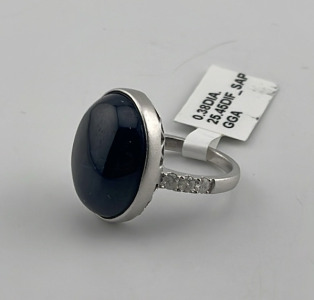 .925 Sterling Silver 25.45ct. Star Sapphire Corundum & 0.38ct. Diamond Ring Size 7 W/ GGA C.O.A. ( $4,730.00 Retail Value)