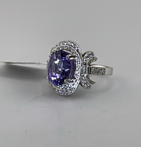 Platinum 6.59ct. Tanzanite & 1.11ct. Diamond Ladies Ring, Size 7 W/ AIGL C.O.A. (Retail Value $23,538.00)