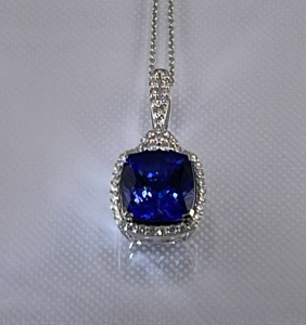 Tanzanite & Diamond Platinum Pendant Necklace W/ 6.88ct. Tanzanite & 0.50ct. Diamonds W/ AIGL C.O.A. (Retail Value $27,693)
