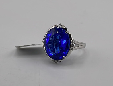 Platinum 24.89ct. Sapphire & 0.28ct. Diamonds Ladies Ring, Size 7 W/ GGA C.O.A. (Retail Value $8,720.00)