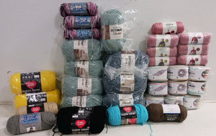 (35) Skeins of Assorted Yarn - (6) Red Heart (7) Caron Simply Soft (10) Caron Cakes (9) Bernat Blanket (3) I Love This Yarn